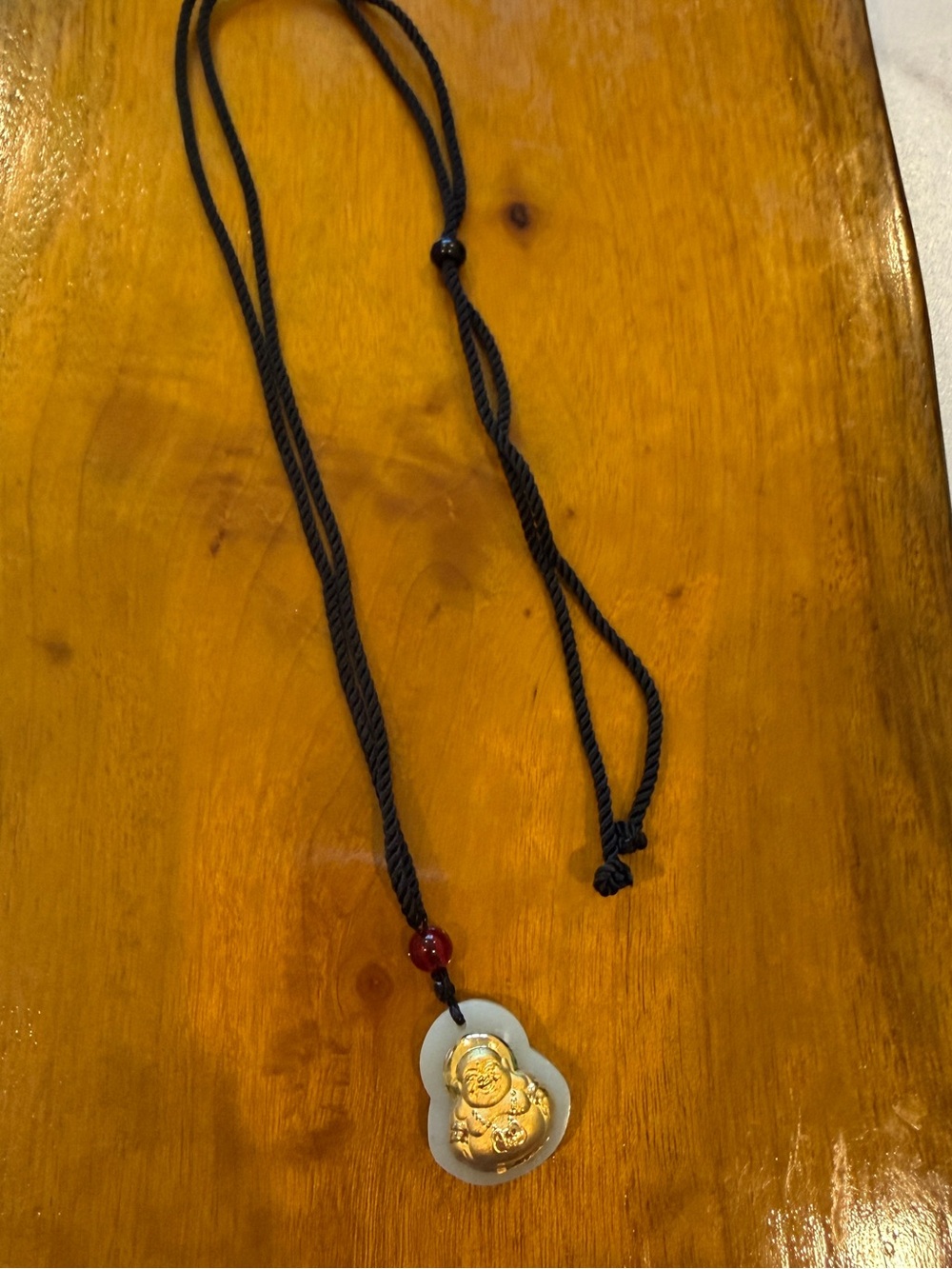 Gold Laughing Buddha Pendant Necklace in Black Cord